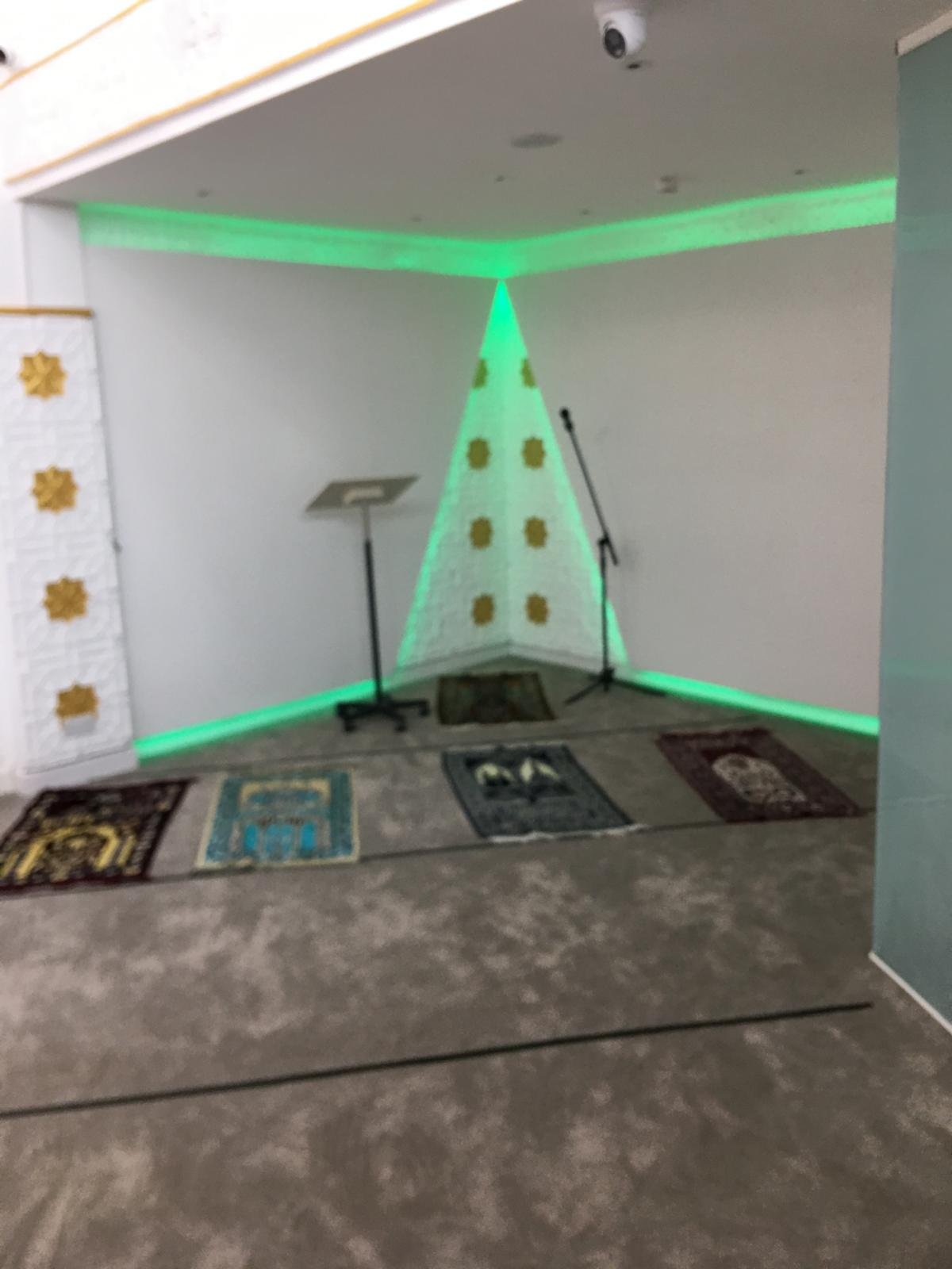 The mihrab with gold rosettes in the prayer hall